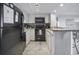 Well-lit kitchen with granite countertops and modern appliances at 5511 North Ocean Blvd. # 1105, Myrtle Beach, SC 29577