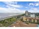 Beautiful ocean view from above with buildings and greenery visible at 5511 North Ocean Blvd. # 1105, Myrtle Beach, SC 29577