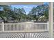 Enjoy the view from the balcony overlooking the neighborhood and lush treetops at 6001-L11 South Kings Hwy., Myrtle Beach, SC 29575