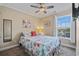 Inviting bedroom featuring beachy wall art and ceiling fan at 6001-L11 South Kings Hwy., Myrtle Beach, SC 29575