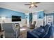 Bright and airy living room decorated with an anchor and coastal artwork at 6001-L11 South Kings Hwy., Myrtle Beach, SC 29575