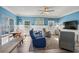 Cozy living room features stylish decor, comfy seating, and blue walls at 6001-L11 South Kings Hwy., Myrtle Beach, SC 29575