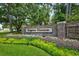 The Kingston Plantation entrance sign is surrounded by colorful landscaping at 601 Gloucester Terrace Circle # 3-A, Myrtle Beach, SC 29572