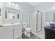 Bright bathroom features a shower with a sliding glass door, and white vanity at 601 N Hillside Dr. # 4632, North Myrtle Beach, SC 29582