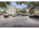 Well-maintained condo building with ample parking surrounded by mature trees and landscaping at 601 N Hillside Dr. # 4632, North Myrtle Beach, SC 29582