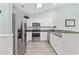 Well-lit kitchen featuring stainless steel appliances and granite countertops at 601 N Hillside Dr. # 4632, North Myrtle Beach, SC 29582