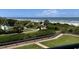 Inviting outdoor space overlooking the beach with manicured lawn and coastal vegetation at 645 Retreat Beach Circle, Pawleys Island, SC 29585