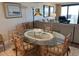 Cozy dining room area with seating for six adjacent to the living room at 645 Retreat Beach Circle, Pawleys Island, SC 29585