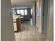 Inviting living room with tiled floors that lead to an outdoor balcony at 645 Retreat Beach Circle, Pawleys Island, SC 29585