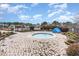 Hot tub surrounded by a paved patio and lush landscaping, perfect for relaxation at 654 Old Castle Loop, Myrtle Beach, SC 29579