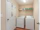 Laundry room featuring washer, dryer, and a shelf for storage at 654 Old Castle Loop, Myrtle Beach, SC 29579