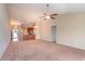 Spacious living room with ceiling fan flowing into the kitchen and dining area, great for entertaining at 654 Old Castle Loop, Myrtle Beach, SC 29579