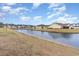 View of the pond with homes in the background at 654 Old Castle Loop, Myrtle Beach, SC 29579