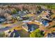 Aerial view of home in a wooded community with neighborhood pool at 685 Tidal Point Ln., Myrtle Beach, SC 29579