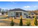 Backyard featuring a patio with a hot tub, swing, and a fire pit at 685 Tidal Point Ln., Myrtle Beach, SC 29579