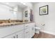 Full bathroom features granite countertops, double sinks, and a white vanity at 685 Tidal Point Ln., Myrtle Beach, SC 29579