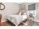 Bedroom featuring a comfortable bed and dark, wood-style flooring at 685 Tidal Point Ln., Myrtle Beach, SC 29579