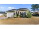 A beautiful front exterior shot with nice landscaping and a well manicured lawn at 685 Tidal Point Ln., Myrtle Beach, SC 29579