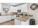 Well-equipped kitchen with stainless steel appliances, granite countertops, and ample cabinet space at 685 Tidal Point Ln., Myrtle Beach, SC 29579