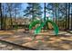 Community playground with modern equipment set in a natural, wooded area at 685 Tidal Point Ln., Myrtle Beach, SC 29579