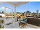 Screened in back porch with furniture, rug and hot tub at 685 Tidal Point Ln., Myrtle Beach, SC 29579