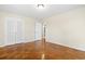 Spacious bedroom featuring hardwood floors, ample natural light, and closet space at 693 Mallard Lake Dr., Myrtle Beach, SC 29577