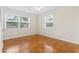 Bedroom featuring wood floors, windows, and a ceiling fan at 693 Mallard Lake Dr., Myrtle Beach, SC 29577