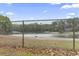 Scenic view of the lake and trees with a fence in the foreground providing a tranquil setting at 693 Mallard Lake Dr., Myrtle Beach, SC 29577