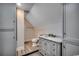 Modern bathroom features a marble countertop vanity, tile floors, and neutral wall color at 702 Compass Point Dr., North Myrtle Beach, SC 29582