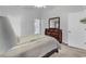 Comfortable bedroom with a wooden dresser, neutral tones, and ample natural light at 7228 Guinevere Circle, Myrtle Beach, SC 29588