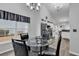 Dining area with modern decor, wood floors, and plenty of light at 7228 Guinevere Circle, Myrtle Beach, SC 29588