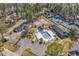 Community aerial view of a pool, tennis courts and parking in the area at 7228 Guinevere Circle, Myrtle Beach, SC 29588