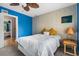 Bedroom featuring a view into the hallway with a leafy ceiling fan and side table at 800 Egret Circle # 34, Little River, SC 29566