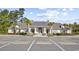 A community building with parking in the Palm Lakes community at 817 Riverwood Ct., Little River, SC 29566