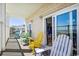Inviting balcony featuring ocean views and colorful seating arrangements at 817 S Ocean Blvd. # 105, North Myrtle Beach, SC 29582
