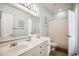 Bathroom featuring a double sink vanity, tiled floors, and updated fixtures at 817 S Ocean Blvd. # 105, North Myrtle Beach, SC 29582