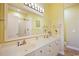 Spacious bathroom showcasing a double vanity and large mirror at 817 S Ocean Blvd. # 105, North Myrtle Beach, SC 29582