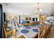 Open-concept dining room with seating for 10+ and easy access to the kitchen and living room at 817 S Ocean Blvd. # 105, North Myrtle Beach, SC 29582