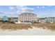 Stunning beachfront condo building with multiple balconies and easy beach access, perfect for coastal living at 817 S Ocean Blvd. # 105, North Myrtle Beach, SC 29582