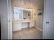 Large bathroom with double sinks, vanity, mirror and good lighting at 9820 Queensway Blvd. # 1502, Myrtle Beach, SC 29572