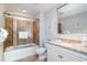 Bright bathroom with a shower, toilet, and vanity with granite countertop at 100 North Beach Blvd. # 506, North Myrtle Beach, SC 29582