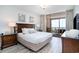 Inviting bedroom with balcony access featuring a comfortable bed and stylish decor at 100 North Beach Blvd. # 506, North Myrtle Beach, SC 29582