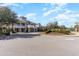 Beautiful community clubhouse featuring manicured landscaping and inviting entrance at 100 North Beach Blvd. # 506, North Myrtle Beach, SC 29582