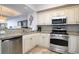 Well-equipped kitchen with stainless steel appliances, granite countertops and decorative accents at 100 North Beach Blvd. # 506, North Myrtle Beach, SC 29582