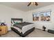 Comfortable bedroom featuring a plush bed, ceiling fan, and a bright window at 1025 Carolina Rd. # Cc2, Conway, SC 29526