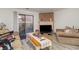 Cozy living room with brick fireplace, sliding glass door access to backyard, hardwood floors and lots of natural light at 1025 Carolina Rd. # Cc2, Conway, SC 29526