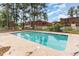 Community pool featuring well maintained water surrounded by mature trees at 1025 Carolina Rd. # Cc2, Conway, SC 29526
