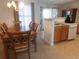 Charming dining room space with table, chairs and updated lighting at 1027 Pinwheel Loop # 3103, Myrtle Beach, SC 29577