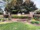 Community entrance sign with lush landscaping and brick columns, welcoming residents and guests at 1027 Pinwheel Loop # 3103, Myrtle Beach, SC 29577