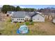 Spacious backyard featuring an above-ground pool, patio, and lush lawn at 113 Cat Tail Bay Dr., Conway, SC 29527